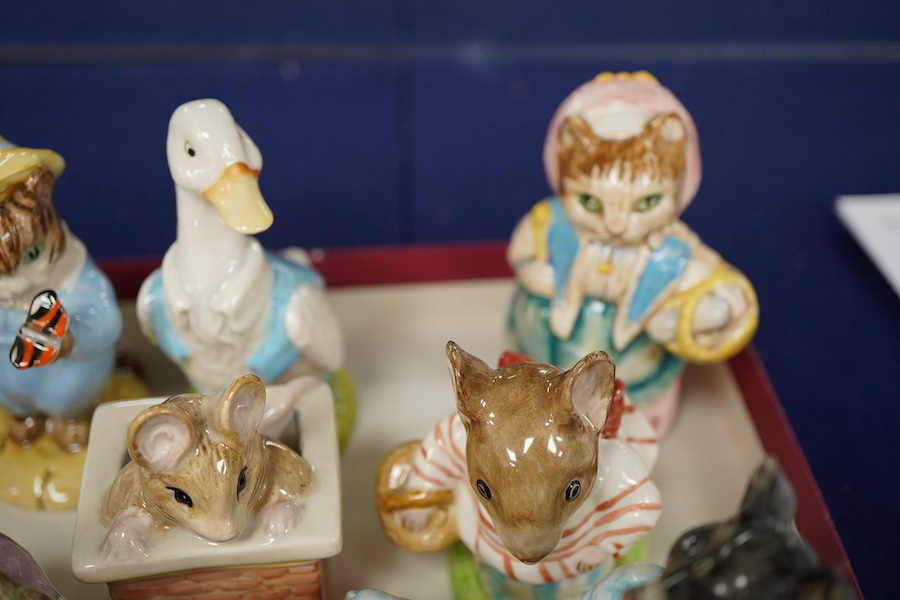 Twelve Beatrix Potter characters, stamp to base F Warne and Co Ltd. Beswick England